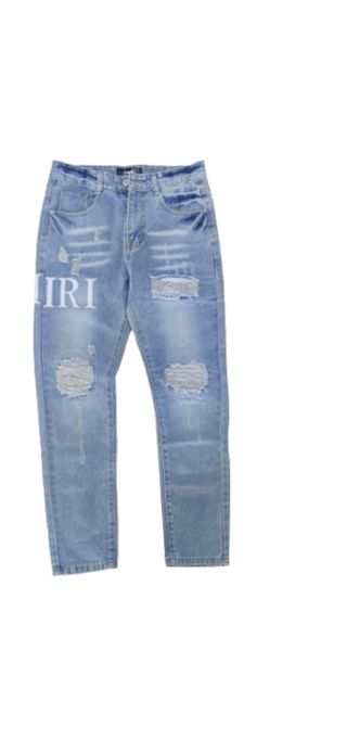 Pantalones Amiri Azules Rotos