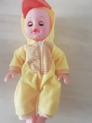 Bambola neonato con tutina gialla nuova