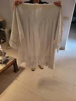 Roquete y tapete litúrgico