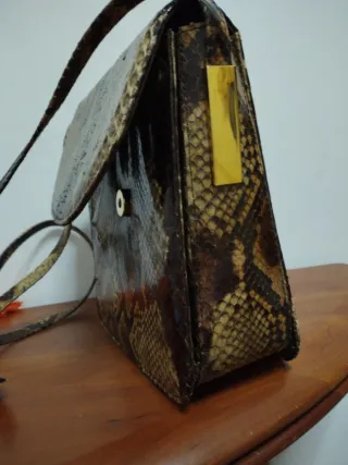 Borsetta in pelle effetto pitone