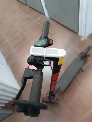 Patinete Eléctrico Negro y Naranja