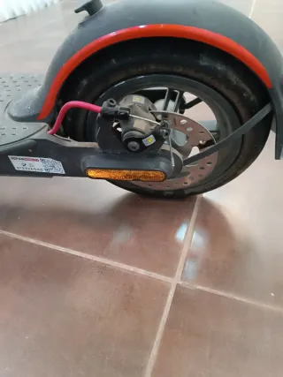 Patinete Eléctrico Negro y Naranja