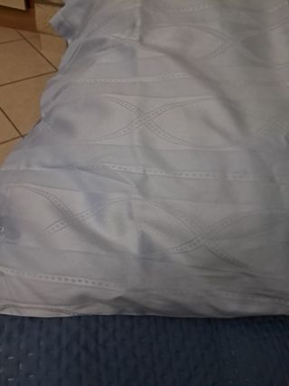 Copripiumino celeste in tessuto