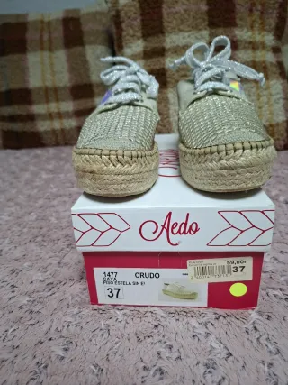 Zapatos dorados y plateados Aleda