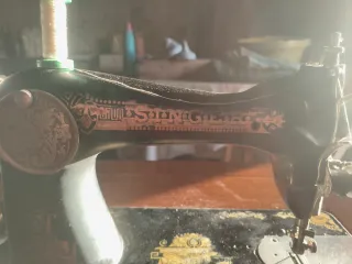 Máquina de coser antigua Stinger