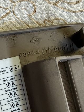 tapa fusible Nissan Terrano 68964-0D000