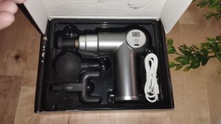 Pistola Masaje + 4 Accesorios