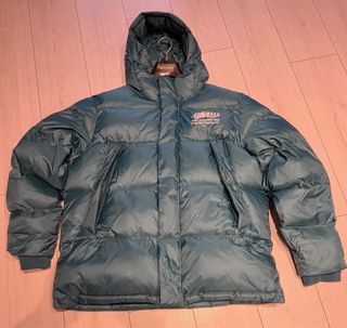 Piumino verde turchese