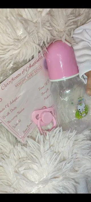 Bambola Reborn femmina con ciuccio e biberon