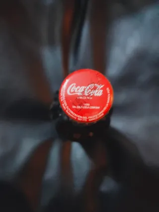 Bottiglia Coca-Cola piena