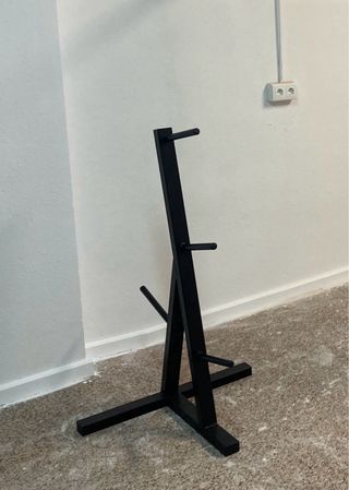 Attrezzatura per palestra a casa con rack, landmine, supporto per impugnature e dischi