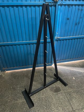 Attrezzatura per palestra a casa con rack, landmine, supporto per impugnature e dischi