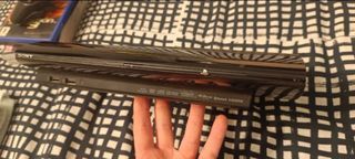 Playstation 3 PS3 Super Slim + 5 Juegos