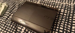 Playstation 3 PS3 Super Slim + 5 Juegos