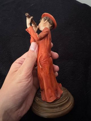 Statuina Bambino con Flauto Arancione