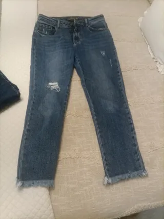 Pantalones vaqueros desgastados