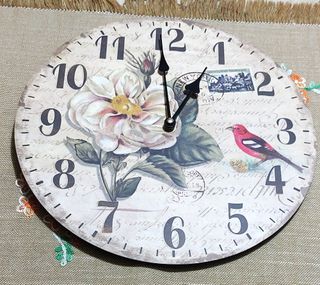 Orologio da parete vintage floreale con uccellino
