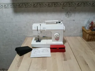 Máquina de coser Singer 2802c