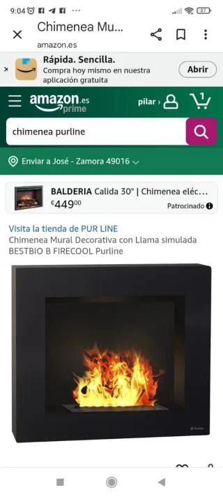 Chimenea con troncos decorativos
