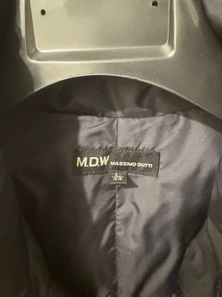 Plumas negro largo con doble cremallera.