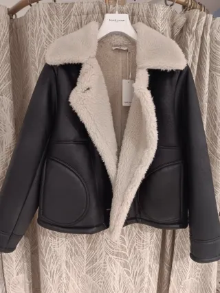 Cazadora Naf Naf doble faz negra