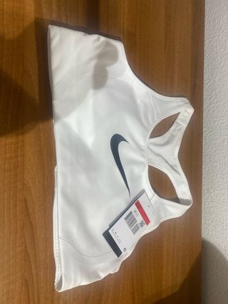 Top deportivo Nike blanco mujer