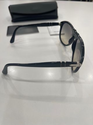 Occhiali Persol neri e marroni