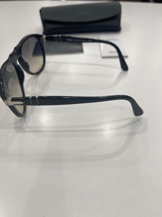 Occhiali Persol neri e marroni