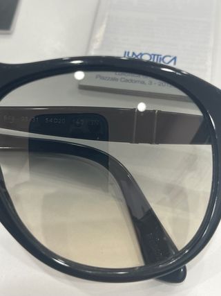 Occhiali Persol neri e marroni