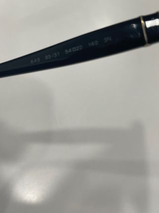 Occhiali Persol neri e marroni