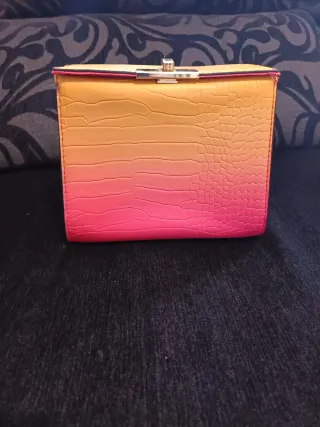 Bolso degradado rosa y amarillo