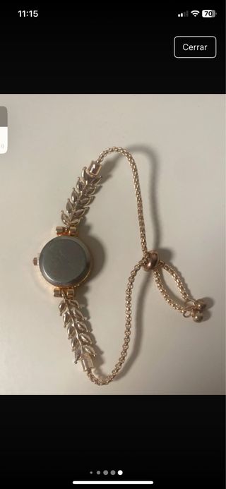 Reloj mujer dorado con piedras verdes