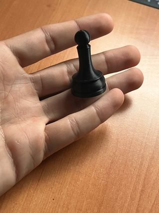 Miniatura peón ajedrez negro