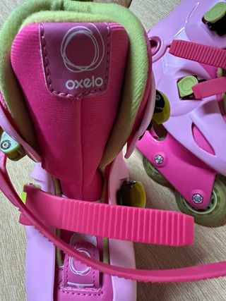 Patines Oxelo niña rosas con protecciones