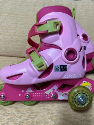 Patines Oxelo niña rosas con protecciones
