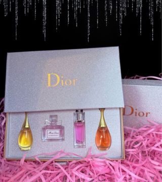 set Dior y set cajita corona con 4 mini perfumes