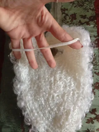 Barba Babbo Natale pelo riccio