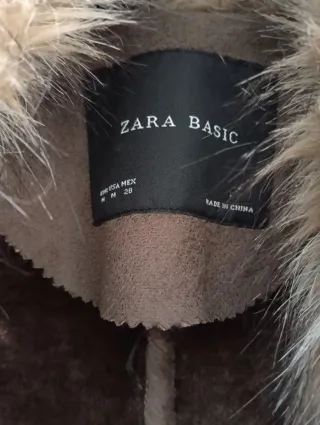 Abrigo marrón Zara y 2 trajes