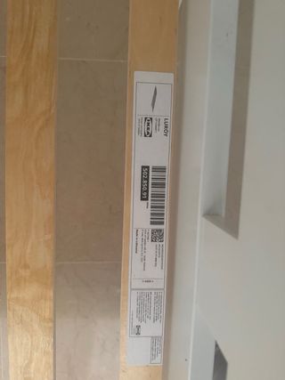 Cama infantil blanca con barrera