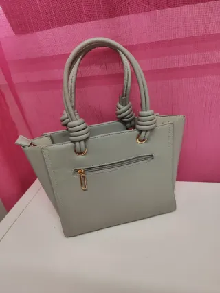 Bolso gris con nudos