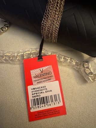 Bolso fiesta Valentino negro y dorado