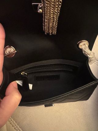 Bolso fiesta Valentino negro y dorado