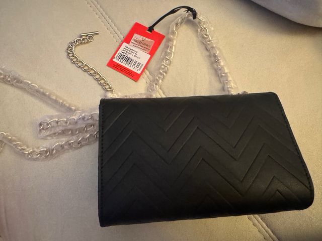 Bolso fiesta Valentino negro y dorado