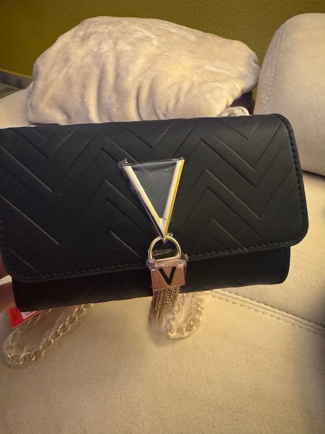 Bolso fiesta Valentino negro y dorado