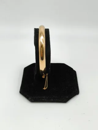 Pulsera Dama Caña oro liso 18kt con cadena segurid