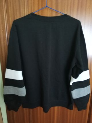 Sudadera con escote trenzado