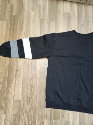 Sudadera con escote trenzado