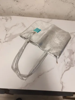 Bolso de mujer plateado nuevo