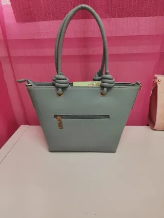 Bolso gris con nudos