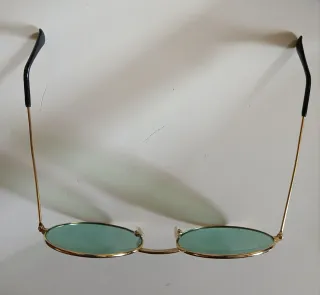 Gafas de sol vintage redondas doradas